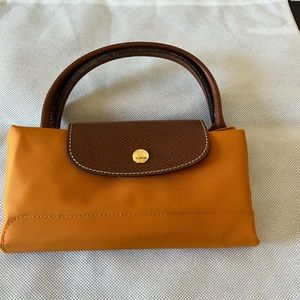 Le plumage small top handle tote bag